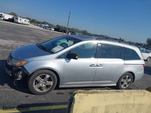 2012 Honda Odyssey Touring with VIN 5FNRL5H90CB066469, listed as a IAAI auction lot 41463009 with NaN miles. Bid and sale history available at carsss.com. Image 15.