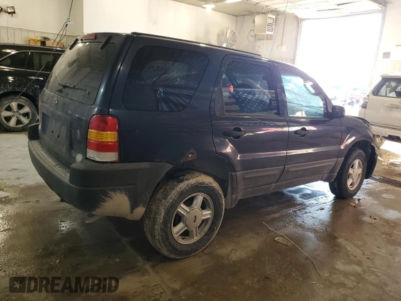 2004 Ford Escape XLS with VIN 1FMYU92154KA14600, listed as a Copart auction lot 83101474 with 305,444 mi miles and Salvage Title. Bid and sale history available at DreamBid. Image 3.