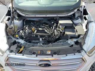 2018 Ford Escape SE z VIN 1FMCU9GD5JUD07359, wystawiony jako Copart lot #55331255 z przebiegiem 142 502 mil mil oraz Czysty tytuł • Clean title. Historia ofert i sprzedaży dostępna na DreamBid. Obrazek 12.