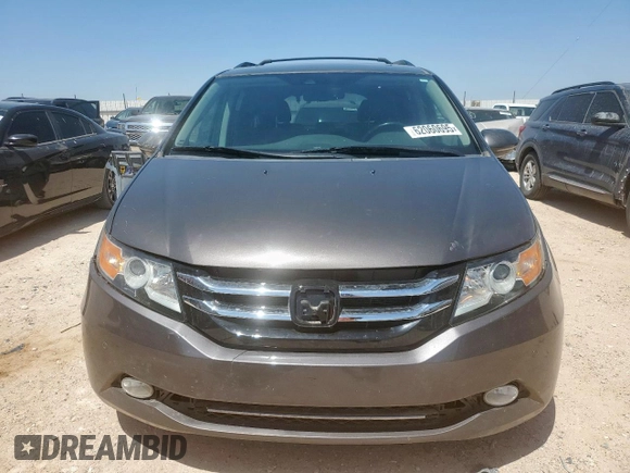 2015 Honda Odyssey Touring Elite z VIN 5FNRL5H97FB002739, wystawiony jako Copart lot #62060695 z przebiegiem 194 604 mil mil oraz Szkoda całkowita • Salvage title. Historia ofert i sprzedaży dostępna na DreamBid. Obrazek 5.