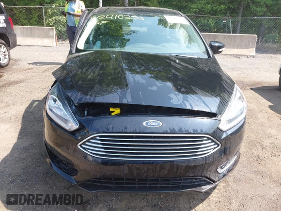 2018 Ford Focus Titanium with VIN 1FADP3J22JL220986, listed as a IAAI auction lot 42410253 with 40,791 mi miles and . Bid and sale history available at DreamBid. Image 12.