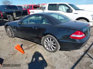 2007 Mercedes-Benz SL-Class 5.5L V8 with VIN WDBSK71F97F129598, listed as a IAAI auction lot 41662468 with 118,479 mi miles. Bid and sale history available at carsss.com. Image 3.