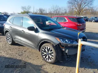 2020 Ford Escape SE Sport Hybrid with VIN 1FMCU9BZ3LUC23532, listed as a IAAI auction lot 40749554 with 96,291 mi miles and . Bid and sale history available at DreamBid. Image 1.