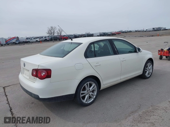 2008 Volkswagen Jetta Sedan S with VIN 3VWJZ71K58M075639, listed as a IAAI auction lot 41855222 with 142,902 mi miles. Bid and sale history available at carsss.com. Image 4.