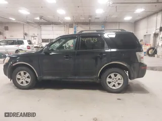2010 Mercury Mariner with VIN 4M2CN9BG0AKJ06493, listed as a IAAI auction lot 41199173 with 143,631 mi miles. Bid and sale history available at carsss.com. Image 12.