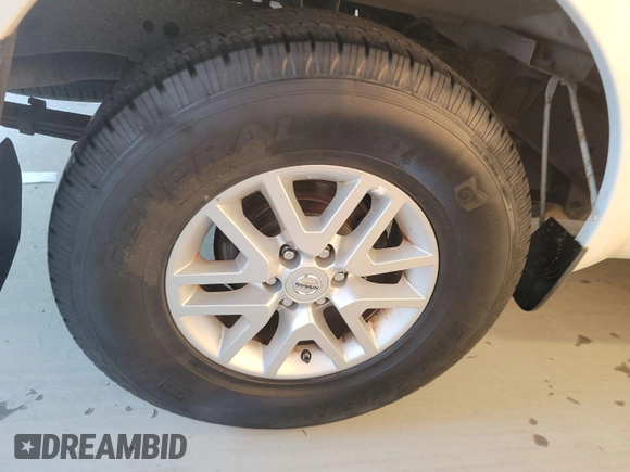 2018 Nissan Frontier SV with VIN 1N6AD0CW9JN760986, listed as a IAAI auction lot 42621224 with 96,456 mi miles and . Bid and sale history available at DreamBid. Image 4.