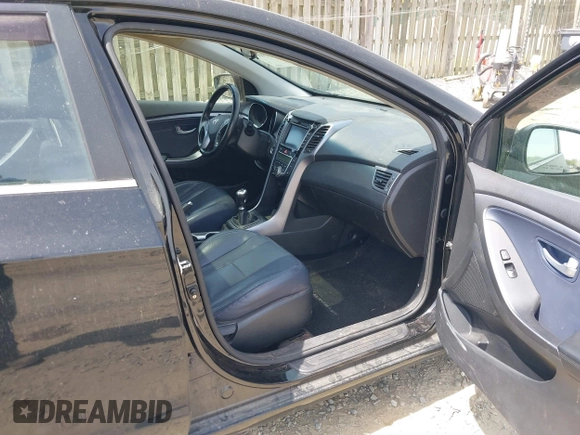 2014 Hyundai Elantra GT with VIN KMHD35LH5EU171894, listed as a IAAI auction lot 42123853 with 97,541 mi miles. Bid and sale history available at carsss.com. Image 5.