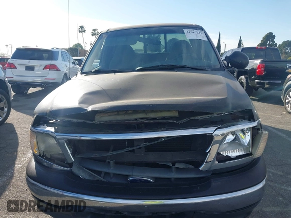 2000 Ford F-150 XL with VIN 1FTRX17L2YNB78032, listed as a IAAI auction lot 41687215 with 1 mi miles. Bid and sale history available at carsss.com. Image 11.