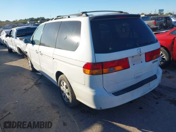 2002 Honda Odyssey EX z VIN 2HKRL18602H522128, wystawiony jako IAAI lot #40879648 z przebiegiem Nie podano mil oraz . Historia ofert i sprzedaży dostępna na DreamBid. Obrazek 3.
