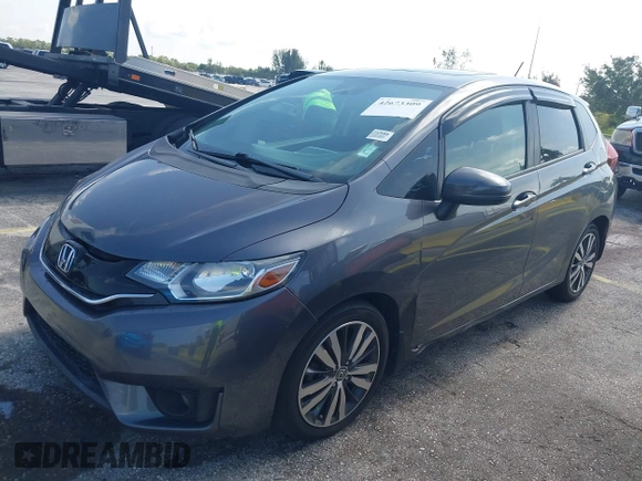 2015 Honda Fit EX-L z VIN 3HGGK5H89FM730013, wystawiony jako IAAI lot #42673309 z przebiegiem 142 660 mil mil oraz . Historia ofert i sprzedaży dostępna na DreamBid. Obrazek 6.