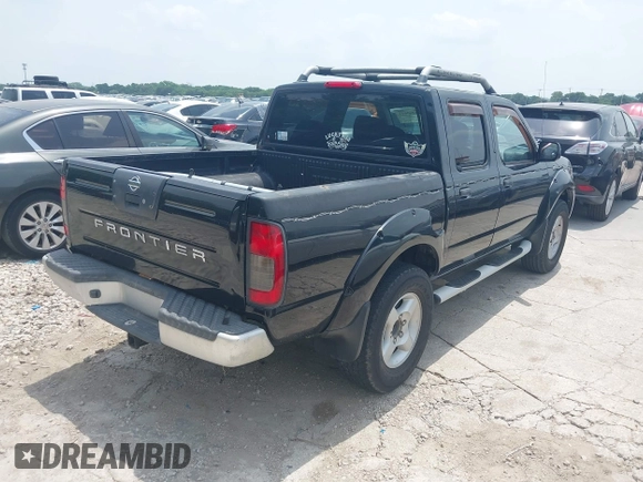 2001 Nissan Frontier SE with VIN 1N6ED27T81C305653, listed as a IAAI auction lot 42260643 with 245,547 mi miles and . Bid and sale history available at DreamBid. Image 4.