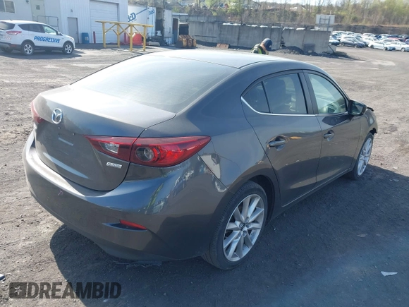 2017 Mazda 3 Touring z VIN 3MZBN1V70HM130081, wystawiony jako IAAI lot #42091430 z przebiegiem 114 480 mil mil oraz . Historia ofert i sprzedaży dostępna na DreamBid. Obrazek 4.