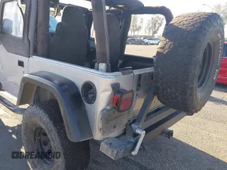 2005 Jeep Wrangler X with VIN 1J4FA39S55P348432, listed as a IAAI auction lot 41868451 with 166,876 mi miles. Bid and sale history available at carsss.com. Image 6.