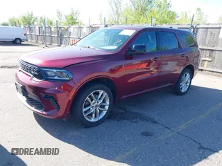 2023 Dodge Durango GT with VIN 1C4RDJDG5PC617489, listed as a IAAI auction lot 42084530 with 70,659 mi miles and . Bid and sale history available at DreamBid. Image 2.