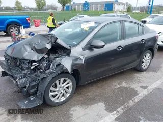 2012 Mazda 3 i Touring with VIN JM1BL1V78C1596808, listed as a IAAI auction lot 42004109 with Not Provided miles and . Bid and sale history available at DreamBid. Image 2.
