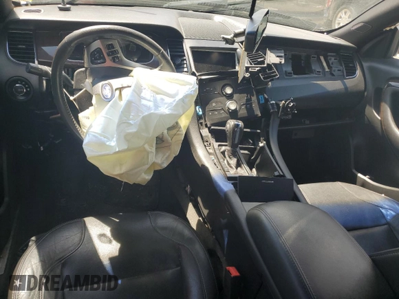2015 Ford Taurus Limited z VIN 1FAHP2F87FG170997, wystawiony jako Copart lot #54346554 z przebiegiem Nie podano mil oraz Szkoda całkowita • Salvage title. Historia ofert i sprzedaży dostępna na DreamBid. Obrazek 8.