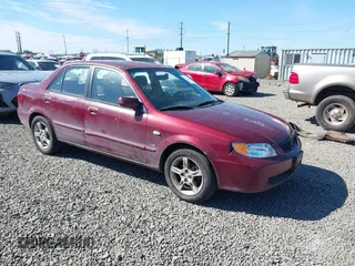 2003 Mazda Protege DX with VIN JM1BJ225930195479, listed as a IAAI auction lot 42199689 with 148,382 mi miles and . Bid and sale history available at DreamBid. Image 1.