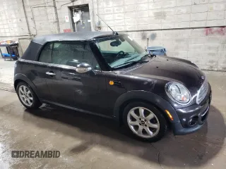 2015 MINI Convertible z VIN WMWZN3C59FT266929, wystawiony jako Copart lot #57264985 z przebiegiem 110 200 mil mil oraz Szkoda całkowita • Salvage title. Historia ofert i sprzedaży dostępna na DreamBid. Obrazek 4.