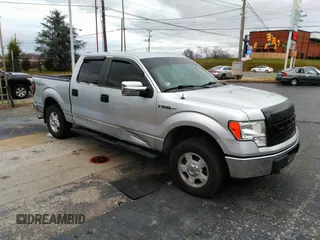 2013 Ford F-150 XL with VIN 1FTFW1EFXDKD77733, listed as a IAAI auction lot 41743951 with 228,296 mi miles. Bid and sale history available at carsss.com. Image 1.