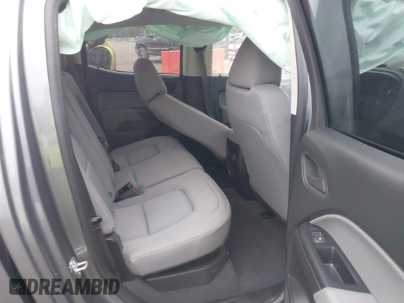 2021 Chevrolet Colorado 2WD Work Truck with VIN 1GCGSBEA6M1278097, listed as a IAAI auction lot 42010677 with 20,288 mi miles and . Bid and sale history available at DreamBid. Image 8.