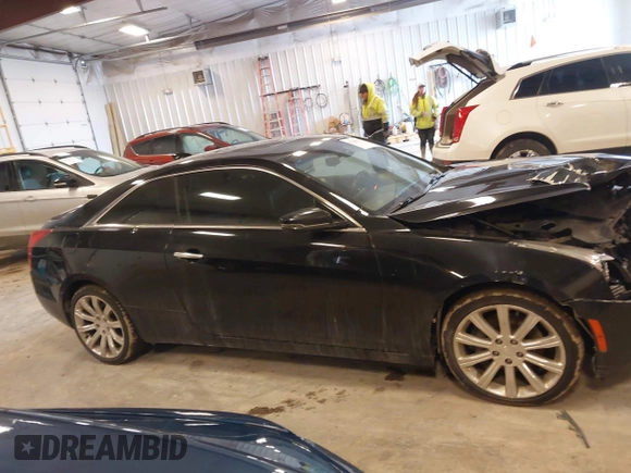 2016 Cadillac ATS AWD z VIN 1G6AG1RX2G0167642, wystawiony jako IAAI lot #41708537 z przebiegiem 217 560 mil mil oraz . Historia ofert i sprzedaży dostępna na DreamBid. Obrazek 13.
