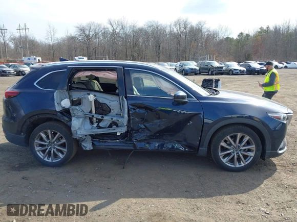 2021 Mazda CX-9 Grand Touring with VIN JM3TCBDY7M0540359, listed as a IAAI auction lot 41711366 with 47,391 mi miles and . Bid and sale history available at carsss.com. Image 13.