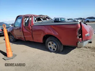 2000 Ford F-150 XL with VIN 1FTZX1728YNA87502, listed as a Copart auction lot 54870295 with 219,971 mi miles and Salvage title. Bid and sale history available at DreamBid. Image 2.