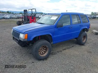 1996 Jeep Grand Cherokee Laredo with VIN 1J4GZ58YXTC329037, listed as a IAAI auction lot 42051175 with 314,571 mi miles and . Bid and sale history available at DreamBid. Image 17.