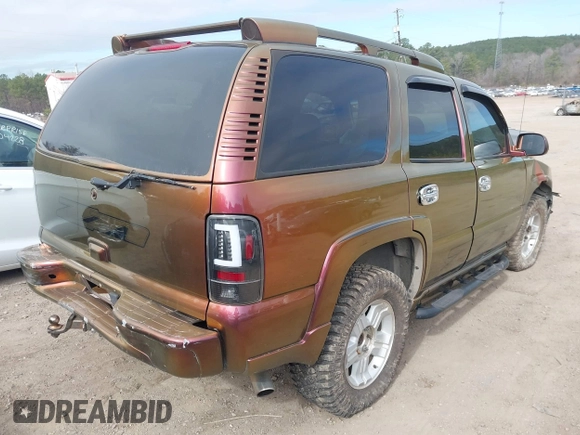 2003 Chevrolet Tahoe LT with VIN 1GNEK13Z23R302221, listed as a IAAI auction lot 41636853 with 264,525 mi miles. Bid and sale history available at carsss.com. Image 4.