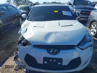 2013 Hyundai Veloster w/Black Int with VIN KMHTC6AD5DU116443, listed as a IAAI auction lot 41635858 with 170,173 mi miles and . Bid and sale history available at DreamBid. Image 12.