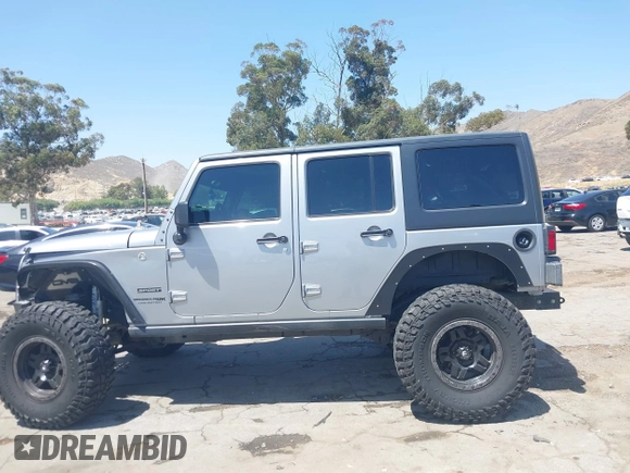 2018 Jeep Wrangler Unlimited Sport with VIN 1C4BJWDG4JL807265, listed as a IAAI auction lot 42520648 with 69,229 mi miles and . Bid and sale history available at DreamBid. Image 15.