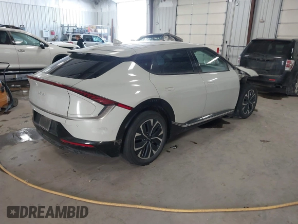 2022 Kia EV6 Wind with VIN KNDC34LA1N5028691, listed as a IAAI auction lot 41346742 with 110,944 mi miles. Bid and sale history available at carsss.com. Image 4.