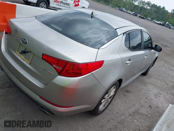 2013 Kia Optima EX z VIN 5XXGN4A70DG251141, wystawiony jako IAAI lot #42410478 z przebiegiem 245 963 mil mil oraz . Historia ofert i sprzedaży dostępna na DreamBid. Obrazek 4.