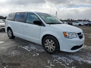 2018 Dodge Grand Caravan SE with VIN 2C4RDGBG0JR138255, listed as a Copart auction lot 45346165 with 99,859 mi miles and Salvage Title. Bid and sale history available at carsss.com. Image 4.