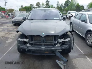 2015 BMW X5 xDrive35i z VIN 5UXKR0C59F0K55226, wystawiony jako IAAI lot #41952931 z przebiegiem 156 655 mil mil oraz . Historia ofert i sprzedaży dostępna na DreamBid. Obrazek 12.