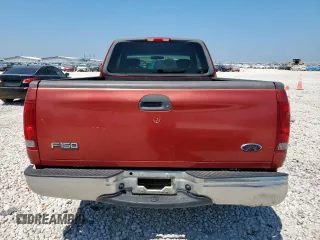 2002 Ford F-150 XL with VIN 1FTRX17202NA40522, listed as a Copart auction lot 58208915 with 100,297 mi miles and Salvage title. Bid and sale history available at DreamBid. Image 6.