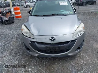 2012 Mazda 5 Touring with VIN JM1CW2CLXC0100740, listed as a IAAI auction lot 41918794 with 234,102 mi miles and . Bid and sale history available at DreamBid. Image 6.