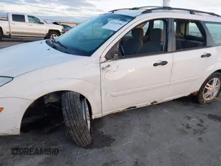 2001 Ford Focus SE with VIN 1FAFP36341W164123, listed as a IAAI auction lot 41143386 with 107,477 mi miles and . Bid and sale history available at carsss.com. Image 6.