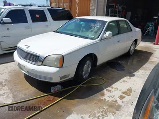 2004 Cadillac DeVille z VIN 1G6KD54Y04U102197, wystawiony jako IAAI lot #41940502 z przebiegiem Nie podano mil oraz . Historia ofert i sprzedaży dostępna na DreamBid. Obrazek 2.