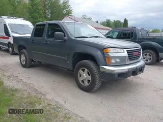 2008 GMC Canyon SLE2 z VIN 1GTDT43EX88220962, wystawiony jako IAAI lot #42361180 z przebiegiem 143 517 mil mil oraz . Historia ofert i sprzedaży dostępna na DreamBid. Obrazek 1.