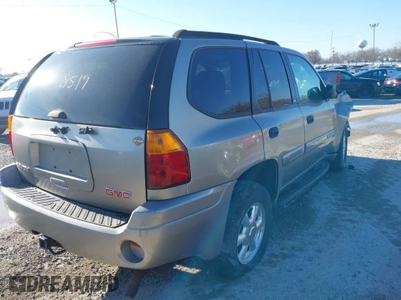 2003 GMC Envoy SLE with VIN 1GKDT13S732168534, listed as a IAAI auction lot 38049193 with 230,894 mi miles. Bid and sale history available at carsss.com. Image 4.