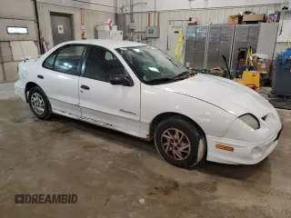 2002 Pontiac Sunfire SE z VIN 1G2JB524027419895, wystawiony jako Copart lot #82632844 z przebiegiem Nie podano mil oraz Nie do naprawy • Non repairable. Historia ofert i sprzedaży dostępna na DreamBid. Obrazek 4.