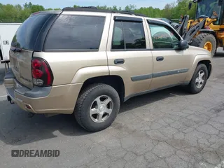 2004 Chevrolet TrailBlazer LS with VIN 1GNDT13S842241592, listed as a IAAI auction lot 42245353 with 115,691 mi miles and . Bid and sale history available at DreamBid. Image 4.
