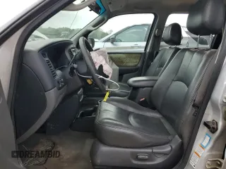 2003 Mazda Tribute ES with VIN 4F2CZ06193KM25468, listed as a Copart auction lot 59879914 with 214,393 mi miles and Salvage Title. Bid and sale history available at carsss.com. Image 7.