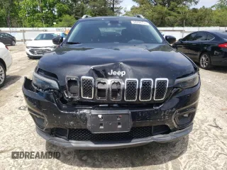 2019 Jeep Cherokee Latitude Plus with VIN 1C4PJMLB7KD101158, listed as a Copart auction lot 58246115 with 144,807 mi miles and Salvage title. Bid and sale history available at DreamBid. Image 5.