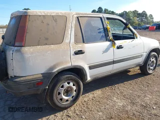 1999 Honda CR-V LX with VIN JHLRD284XXC020668, listed as a IAAI auction lot 41842024 with 224,359 mi miles. Bid and sale history available at carsss.com. Image 4.