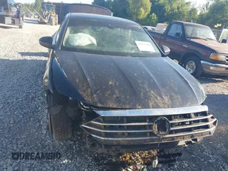 2020 Volkswagen Jetta SEL z VIN 3VWE57BU2LM093697, wystawiony jako IAAI lot #40437984 z przebiegiem 76 803 mil mil oraz . Historia ofert i sprzedaży dostępna na DreamBid. Obrazek 6.
