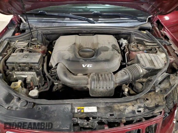 2015 Jeep Grand Cherokee Summit with VIN 1C4RJFJG2FC664245, listed as a Copart auction lot 54131515 with 141,605 mi miles and Salvage Title. Bid and sale history available at DreamBid. Image 12.