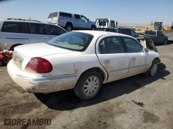 2001 Lincoln Continental z VIN 1LNHM97V31Y673523, wystawiony jako Copart lot #52451385 z przebiegiem 133 879 mil mil oraz Szkoda całkowita • Salvage title. Historia ofert i sprzedaży dostępna na DreamBid. Obrazek 3.