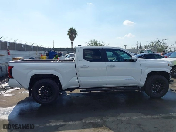 2024 Toyota Tacoma 2WD SR5 with VIN 3TMKB5FN8RM014659, listed as a IAAI auction lot 41399631 with 5,186 mi miles. Bid and sale history available at carsss.com. Image 13.